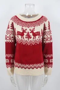Vintage red and cream Jacquard knit Christmas sweater with reindeer and tree patterns.