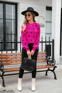 Hot pink polka dot knit sweater for women, stylish street style outfit with hat and boots