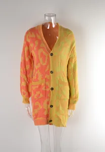 Detailed view of mid-length colorblock knit cardigan with abstract leopard jacquard