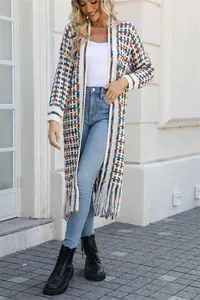 Stylish long-line knit cardigan featuring colorful plaid pattern and bohemian tassel fringe