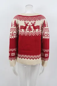 Detailed view of red and white Christmas knit sweater with reindeer jacquard pattern
