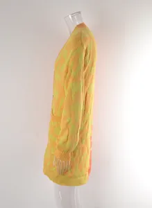 Side view of a mid-length leopard print knitted cardigan in orange and lime green
