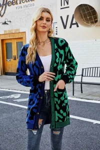 Detailed view of women's leopard print color-block knit cardigan in blue and green.