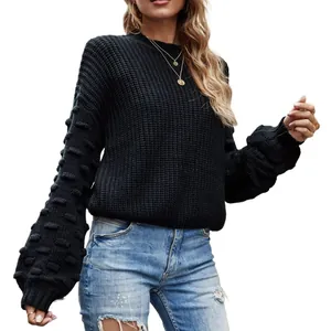 Black long sleeve knitted pullover sweater with bobble texture and wide lantern sleeves