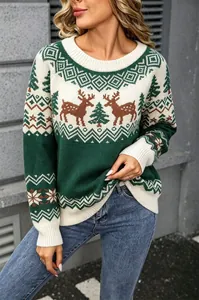 Close-up of vintage green Christmas sweater with reindeer and snowflake jacquard patterns
