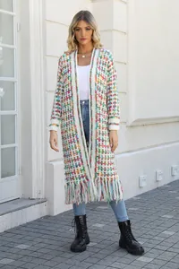 Bohemian style colorful long knit cardigan sweater with tassel hem shown on a fashion model