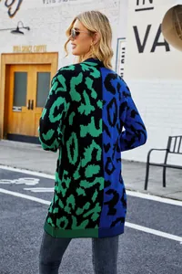 Back view of a green and blue leopard print patchwork knitted cardigan jacket