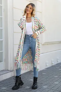 A vibrant multi-colored knit long cardigan featuring long tassel fringe and woven patterns