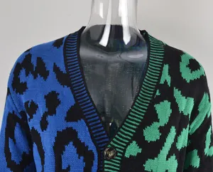 Close-up detail of a vibrant leopard print patchwork knit cardigan in blue and green colors