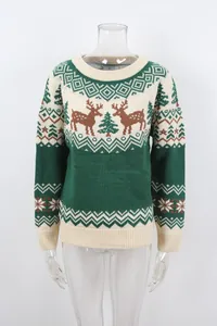 Detailed view of green Christmas knitted sweater featuring reindeer and tree jacquard