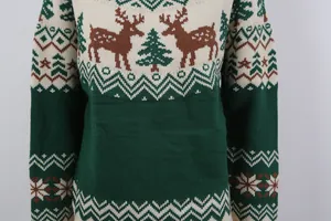 Detailed macro view of vintage Christmas jacquard knit sweater with reindeer and trees