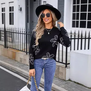 European style black knitted sweater with white flower pattern and long sleeves for women