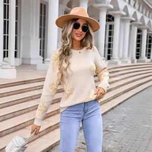 Elegant cream long sleeve crew neck knit sweater with yellow floral pattern for women