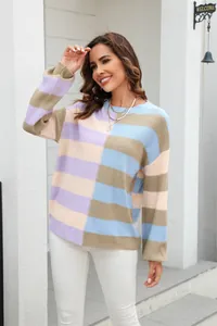 Women's patchwork striped crew neck sweater with vibrant color block knit design.