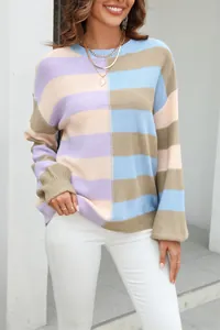 Close-up detail of a women's color-blocked striped crewneck knitted pullover sweater