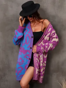 Detail showing a colorful leopard print patchwork oversized knit cardigan on a model