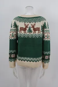 Close-up of vintage Christmas knit sweater with green and cream reindeer jacquard pattern