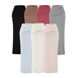 Collection multicolore de jupes longues moulantes avec taille asymétrique froncée