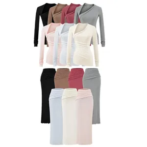 Ensemble haut à col asymétrique et jupe longue assortie disponible en plusieurs couleurs