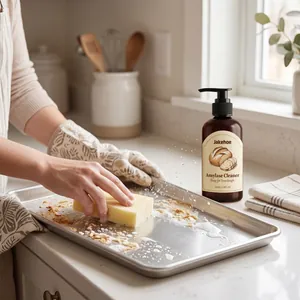 Effective Amylase cleaner removing sourdough residue from a metal tray in a bright kitchen
