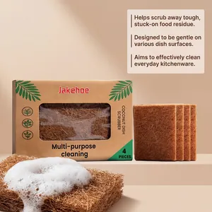 Primer plano de estropajo de fibra de coco ecológico con espuma para limpiar platos