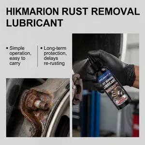 Close-up showing Hikmarion rust removal spray application on a corroded metal bolt