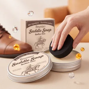 Detailed view of Brunizo Saddle Soap application on leather using a black sponge