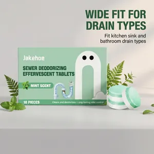 Detail view of Jakehoe sewer deodorizing tablets with mint scent packaging and leaves