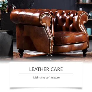 Close-up of polished leather texture on a brown armchair showing care results