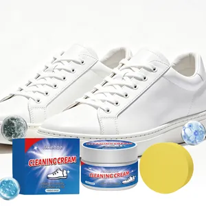 Makroansicht des JAKEHOE Schuhreinigungsmittel-Sets mit gelbem Applikatorschwamm