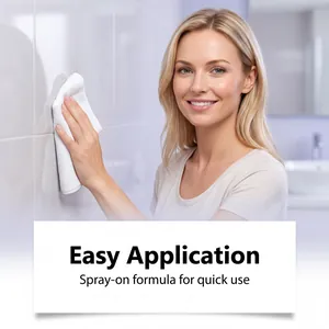 Detail of woman cleaning bathroom wall tiles with spray-on stain remover formula.