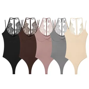 Sleeveless women's halter neck bodysuits with lace trim available in five neutral colors