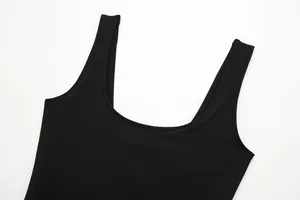Close-up of a black U-neck sleeveless bodysuit showing strap detail and stitching.