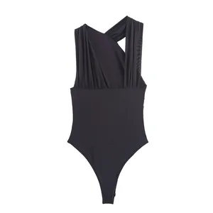 Detail of a black asymmetrical sleeveless bodysuit with pleated shoulders and elegant draping.