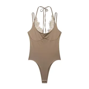Detailed view of coffee rib-knit bodysuit with delicate lace patchwork and halter neck