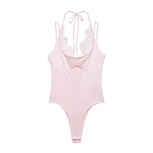 Detailed view of pink sleeveless bodysuit with lace halter neck and eyelash trim detail