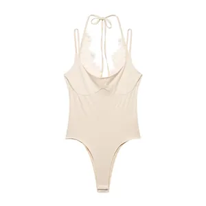 Detailed view of cream halter neck bodysuit with delicate lace trim
