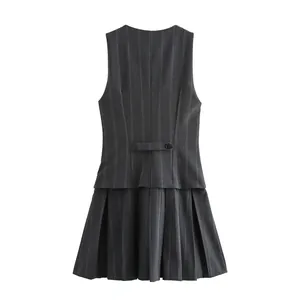 Back view of a grey pinstripe sleeveless pleated dress with a cinched waist detail.