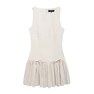 Elegant beige sleeveless mini dress with ruffled skirt and bow details for women