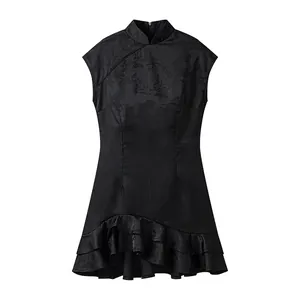 Detail view of chic black sleeveless bodycon dress with ruffled hem and mandarin collar