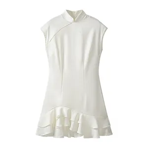 Full body view of a white sleeveless bodycon dress with lotus leaf ruffle hem detail