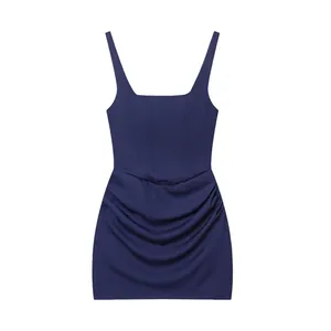 Detail view of navy blue ruched bodycon mini dress with square neck and corset bodice