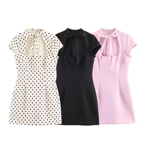 Selection of fashionable sexy mini dresses with bow-knot details in polka dot, black and pink colors