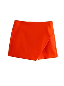 Stylish bright orange high waisted asymmetric skort for women, solid color mini skirt shorts