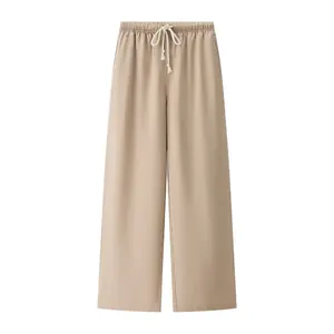 Detailed view of khaki wide-leg casual pants featuring an elastic drawstring waist.