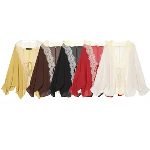 Selection of V-neck lace patchwork blouses in yellow, brown, black, red, and white