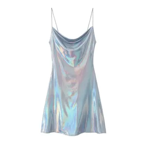 Macro view of the holographic light blue metallic fabric on a cowl neck slip dress