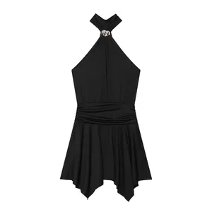 Close-up detail of a black halter neck mini dress with flared skirt and silver buckle