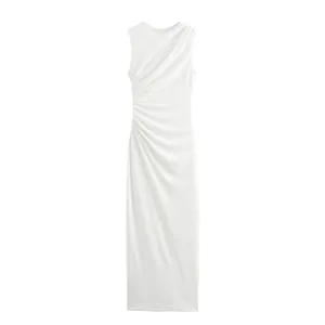 Detailed macro view of elegant white sleeveless ruched midi dress with side draping design.