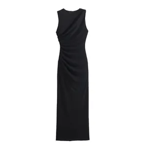 Detailed view of the elegant side ruching on a minimalist black sleeveless midi dress